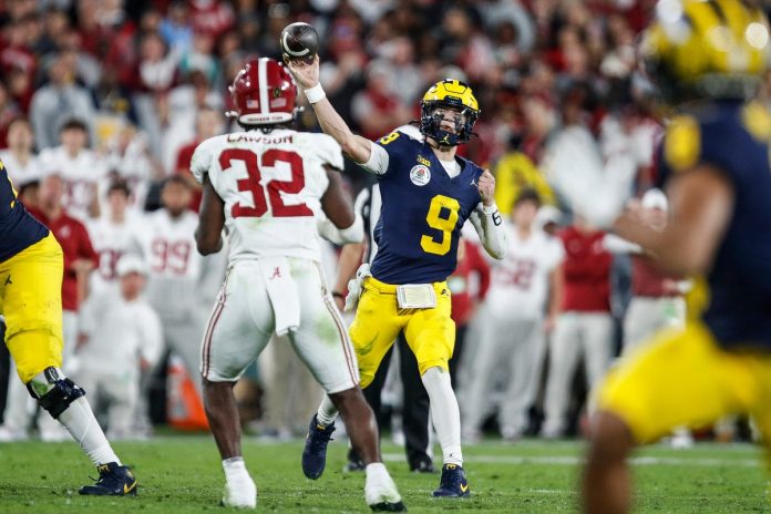 Michigan quarterback J.J. McCarthy (9) makes a pass against Alabama linebacker Deontae Lawson (32) during the second half of the Rose Bowl in Pasadena, Calif., on Monday, Jan. 1, 2024.