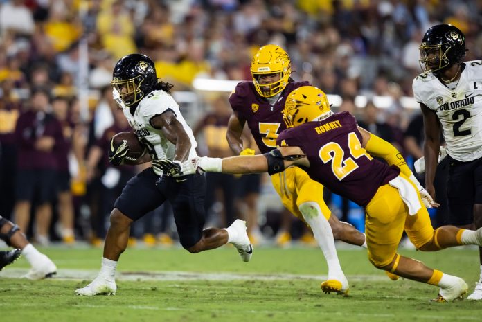 Colorado Buffaloes running back Anthony Hankerson (9) against the Arizona State Sun Devils at Mountain America Stadium.