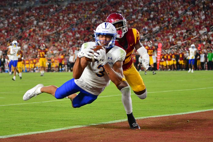 Aug 26, 2023; Los Angeles, California, USA; San Jose State Spartans wide receiver Nick Nash (3) catches a touchdown pass in front of Southern California Trojans cornerback Ceyair Wright (22) during the second half at Los Angeles Memorial Coliseum. Mandatory Credit: Gary A. Vasquez-USA TODAY Sports