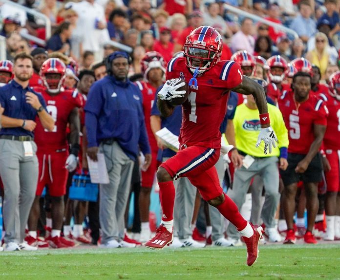 Florida Atlantic wide receiver LaJohntay Wester (1) looks for running room during a 42-20 victory over Monmouth at FAU Stadium on Saturday, September 2, 2023, in Boca Raton, FL.