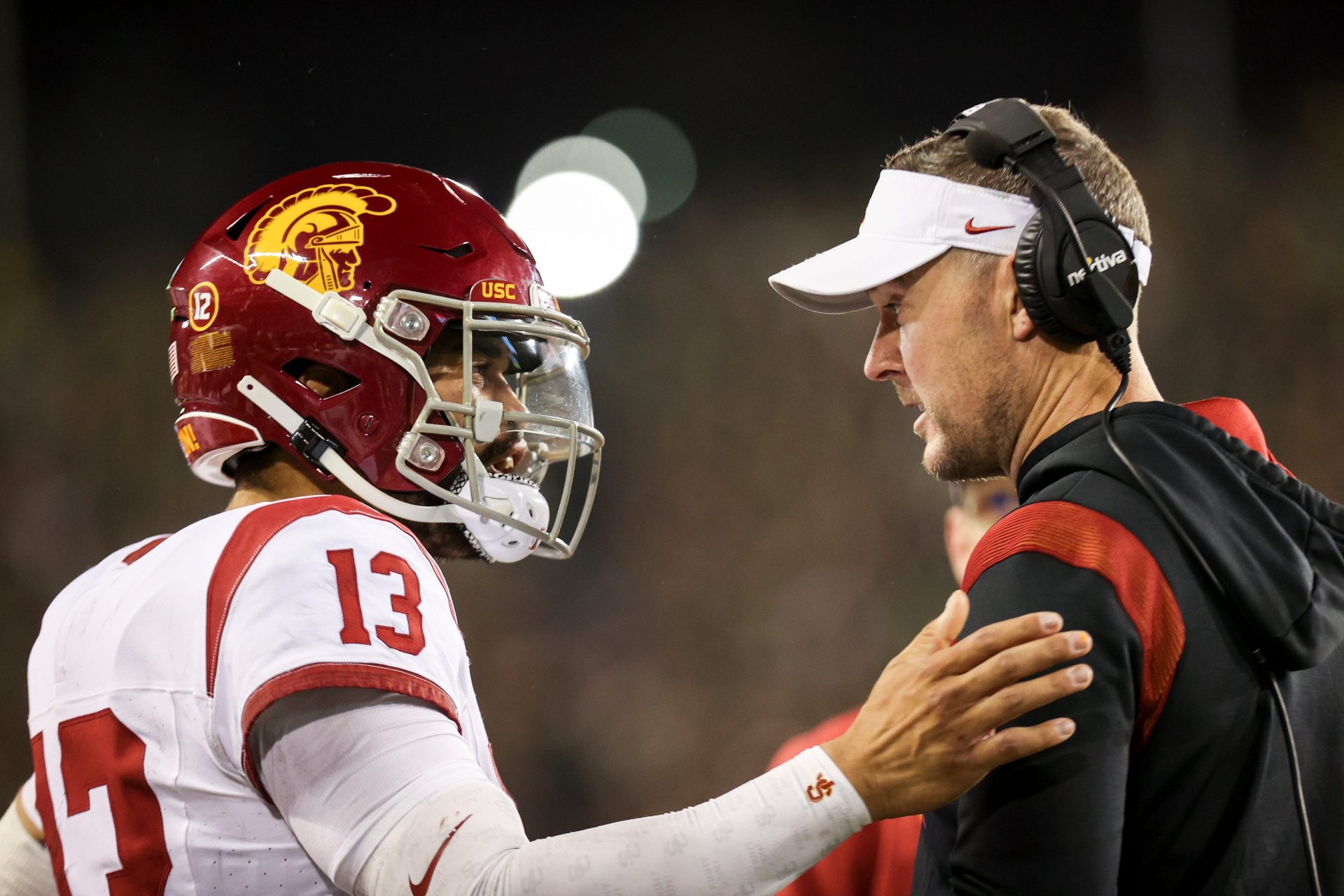 USC Trojans quarterback Caleb Williams talks with USC Trojans head coach Lincoln Riley during the first half of the game against No. 6 Oregon Ducks on Saturday, Nov. 11, 2023, at Autzen Stadium in Eugene, Ore.