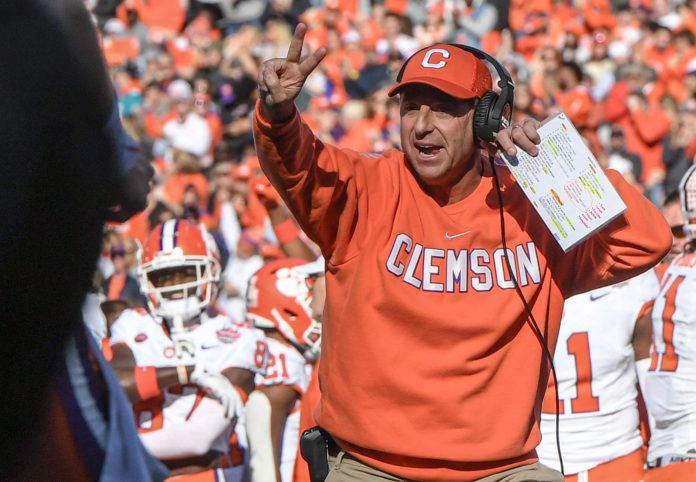 Clemson head coach Dabo Swinney signals to go for a two-point conversion against Kentucky during the fourth quarter of the TaxSlayer Gator Bowl at EverBank Stadium in Jacksonville, Florida, Friday, December 29, 2023. Clemson won 38-35.