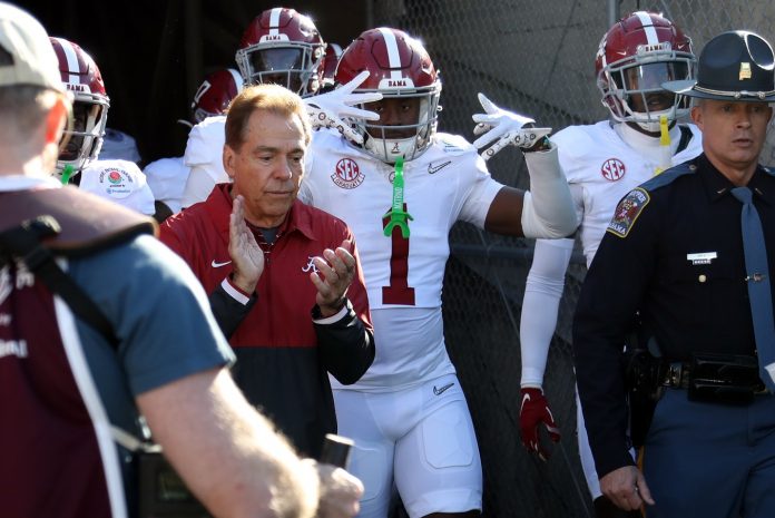 Alabama Crimson Tide head coach Nick Saban walks on the field with his team before the start of the 2024 Rose Bowl college football playoff semifinal game against the Michigan Wolverines at Rose Bowl.