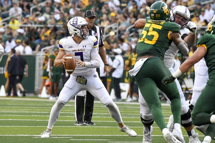 Albany Great Danes quarterback Reese Poffenbarger (7) in action during the game between the Baylor Bears and the Albany Great Danes at McLane Stadium.