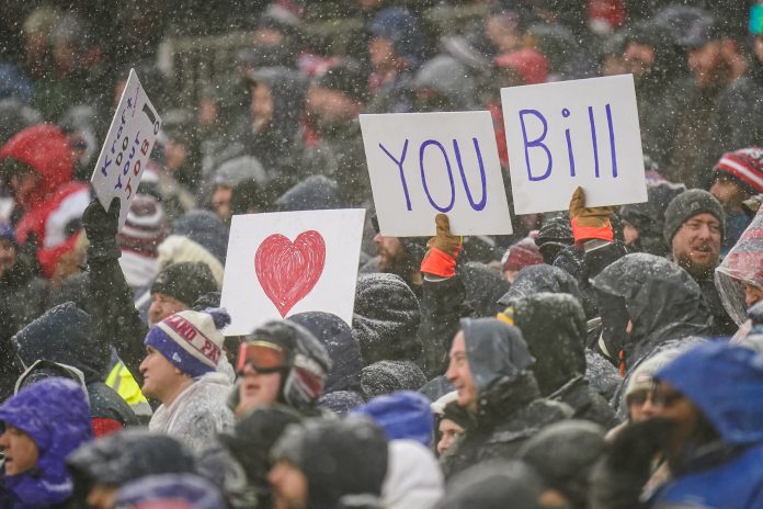 New England Patriots fans hold up signs in supports of head coach Bill Belichick during the game against the New York Jets in the first half at Gillette Stadium.