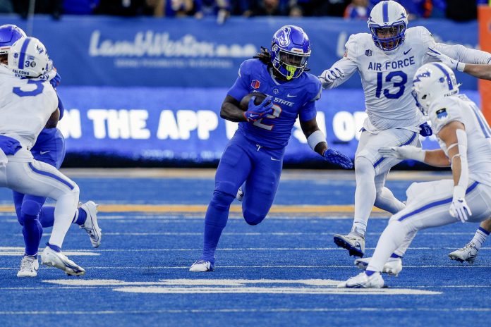 Boise State Broncos running back Ashton Jeanty (2) runs for gain during the second half against the Air Force Falcons at Albertsons Stadium. Boise State defeats Air Force 27-19.