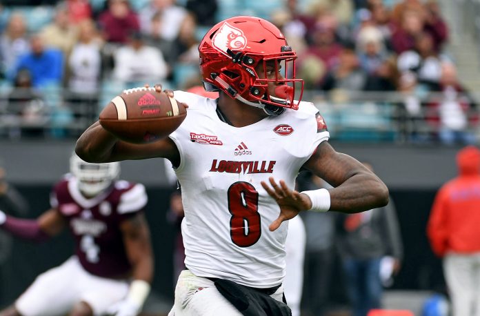 Dec 30, 2017; Jacksonville, FL, USA; Louisville Cardinals quarterback Lamar Jackson (8) throws the ball during the first half against the Mississippi State Bulldogs in the 2017 TaxSlayer Bowl at EverBank Field. Mandatory Credit: Melina Vastola-USA TODAY Sports