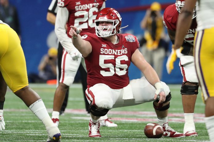 Dec 28, 2019; Atlanta, Georgia, USA; Oklahoma Sooners center Creed Humphrey (56) prepares to hike the ball during the 2019 Peach Bowl college football playoff semifinal game against the LSU Tigers at Mercedes-Benz Stadium. Mandatory Credit: Jason Getz-USA TODAY Sports