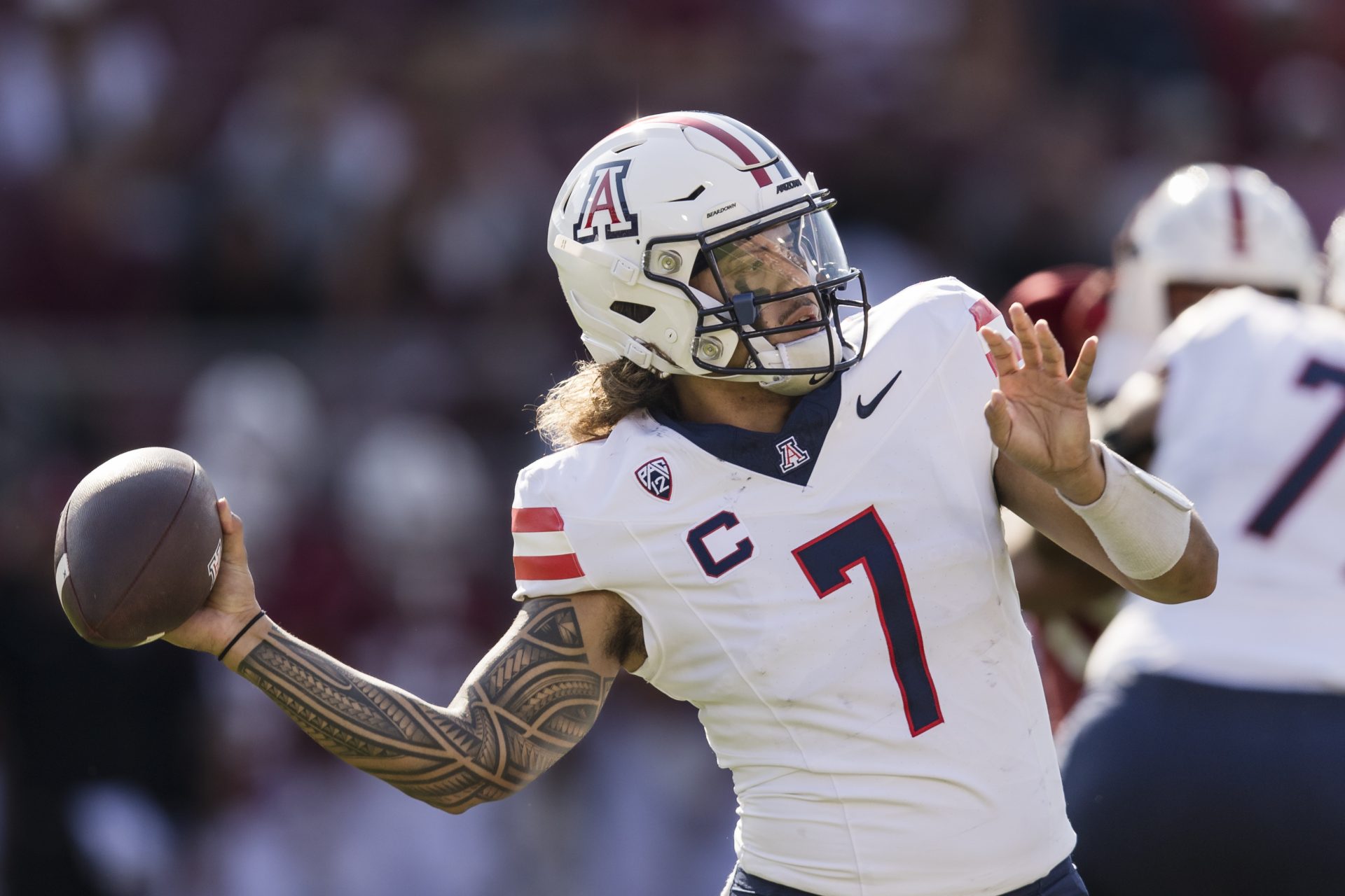 Sep 23, 2023; Stanford, California, USA; Arizona Wildcats quarterback Jayden de Laura (7) passes against the Stanford Cardinal during the first quarter at Stanford Stadium. Mandatory Credit: John Hefti-USA TODAY Sports