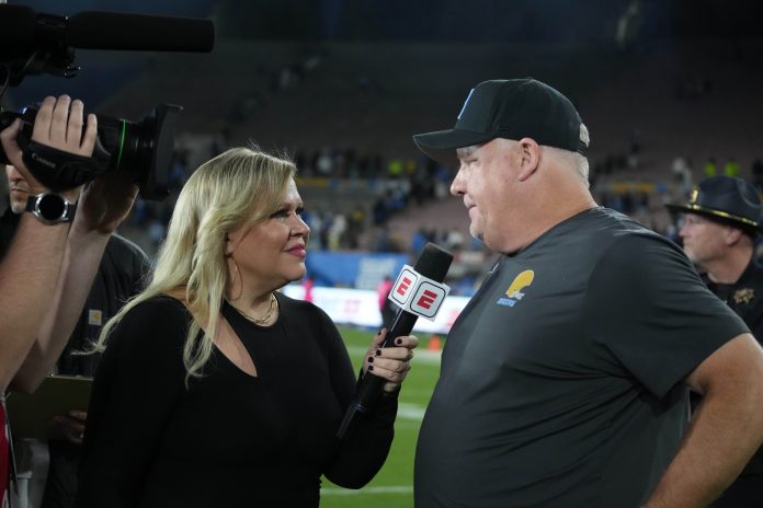 Oct 28, 2023; Pasadena, California, USA; ESPN sideline reporter Holly Rowe (left) interviews UCLA Bruins head coach Chip Kelly after the game against the Colorado Buffaloes at the Rose Bowl. UCLA defeated Colorado 28-16. Mandatory Credit: Kirby Lee-USA TODAY Sports