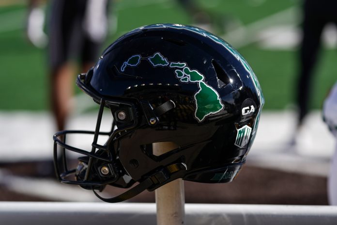 Nov 18, 2023; Laramie, Wyoming, USA; A general view of a Hawaii Rainbow Warriors helmet before the game against the Wyoming Cowboys at Jonah Field at War Memorial Stadium. Mandatory Credit: Troy Babbitt-USA TODAY Sports