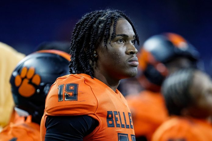 Belleville quarterback Bryce Underwood watches the last seconds of the game against Southfield A&T at the Division 1 state final at Ford Field in Detroit on Sunday, Nov. 26, 2023.