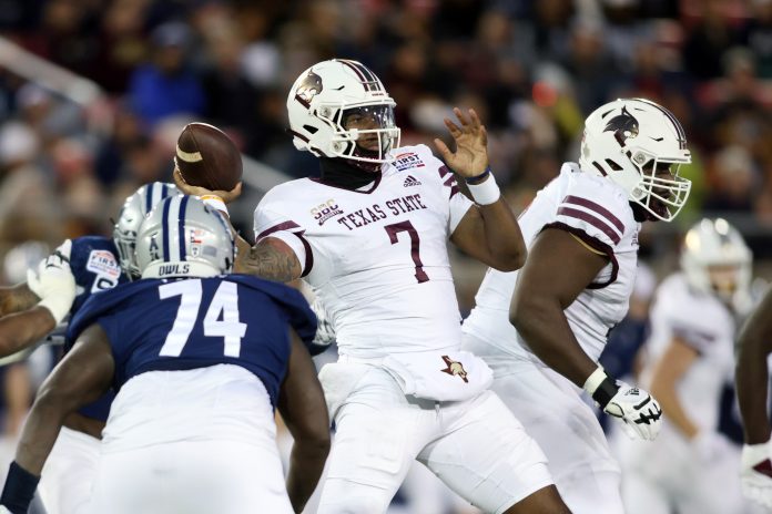 Dec 26, 2023; Dallas, TX, USA; Texas State Bobcats quarterback TJ Finley (7) throws a pass against the Rice Owls in the second quarter at Gerald J Ford Stadium. Mandatory Credit: Tim Heitman-USA TODAY Sports