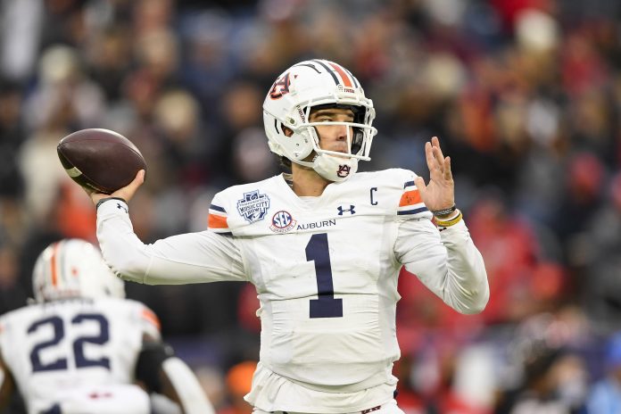 Dec 30, 2023; Nashville, TN, USA; Auburn Tigers quarterback Payton Thorne (1) throws a pass against the Maryland Terrapins during the second half at Nissan Stadium. Mandatory Credit: Steve Roberts-USA TODAY Sports
