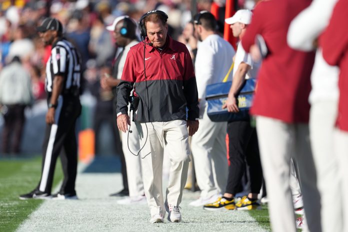 Alabama Crimson Tide head coach Nick Saban walks the sideline during the first half against the Michigan Wolverines in the 2024 Rose Bowl college football playoff semifinal game at Rose Bowl.