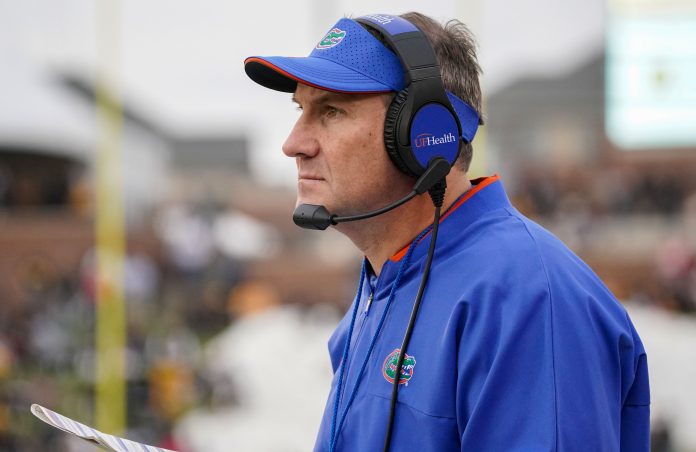 Nov 20, 2021; Columbia, Missouri, USA; Florida Gators head coach Dan Mullen watches play against the Missouri Tigers during the game at Faurot Field at Memorial Stadium. Mandatory Credit: Denny Medley-USA TODAY Sports