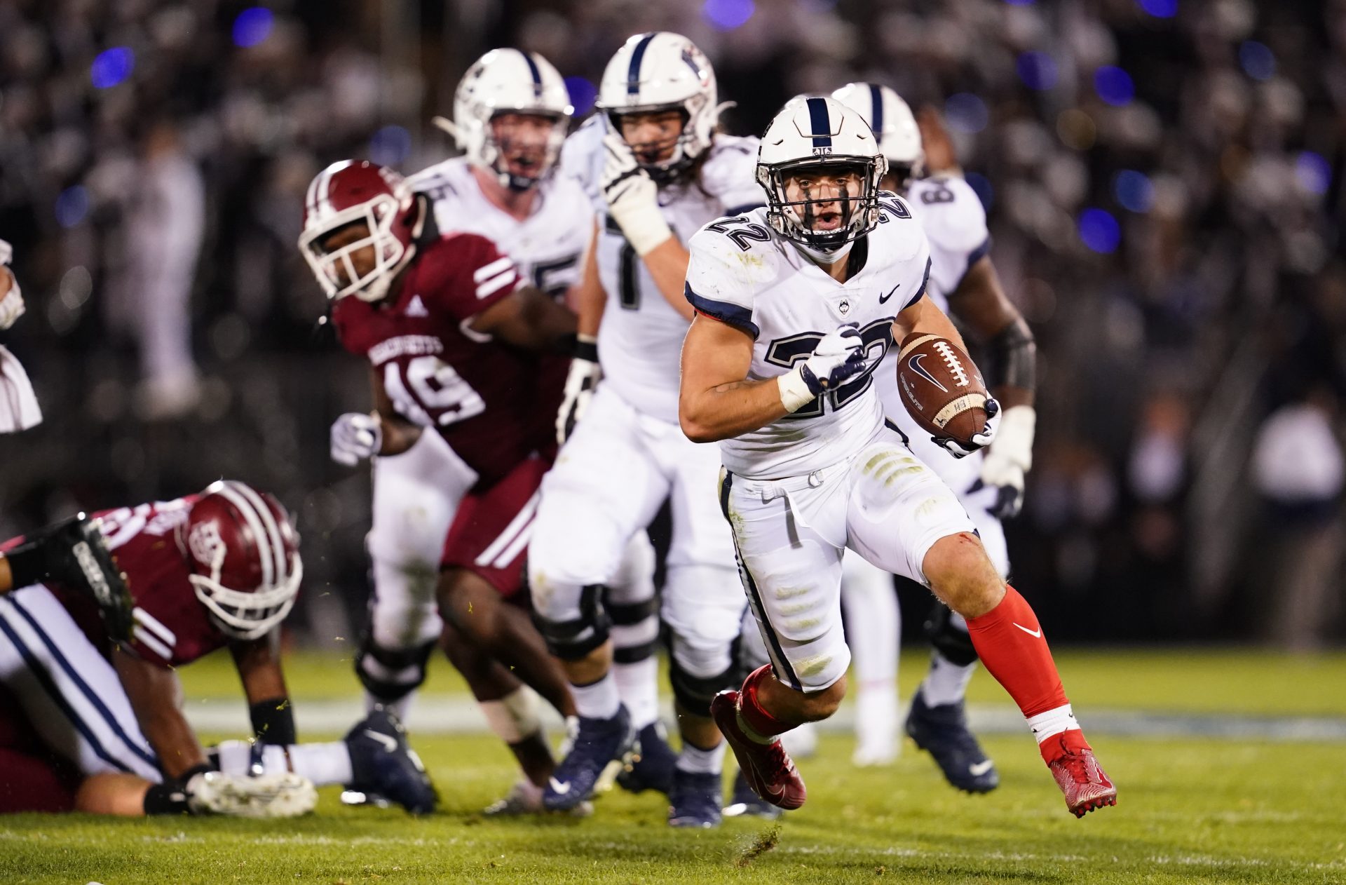 Nov 4, 2022; East Hartford, Connecticut, USA; Connecticut Huskies running back Victor Rosa (22) runs the ball against the Massachusetts Minutemen in the second half at Rentschler Field at Pratt & Whitney Stadium. Mandatory Credit: David Butler II-USA TODAY Sports