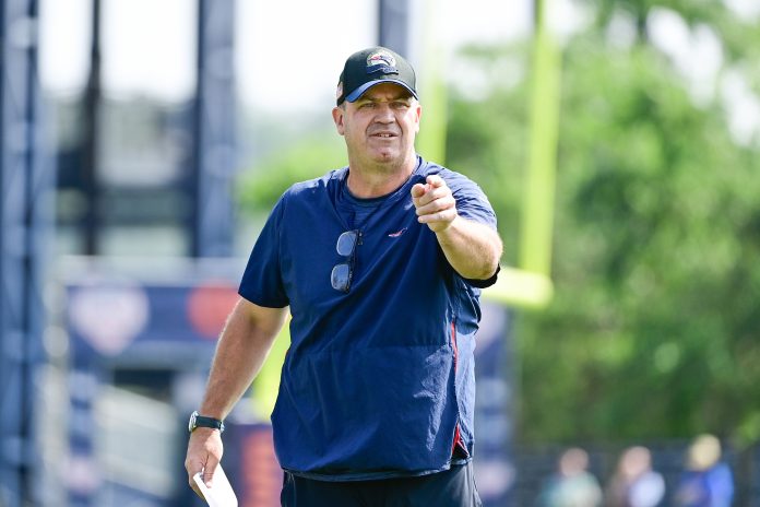 Jul 26, 2023; Foxborough, MA, USA; New England Patriots offensive coordinator/quarterbacks coach Bill O'Brien directs the office on a drill during training camp at Gillette Stadium. Mandatory Credit: Eric Canha-USA TODAY Sports