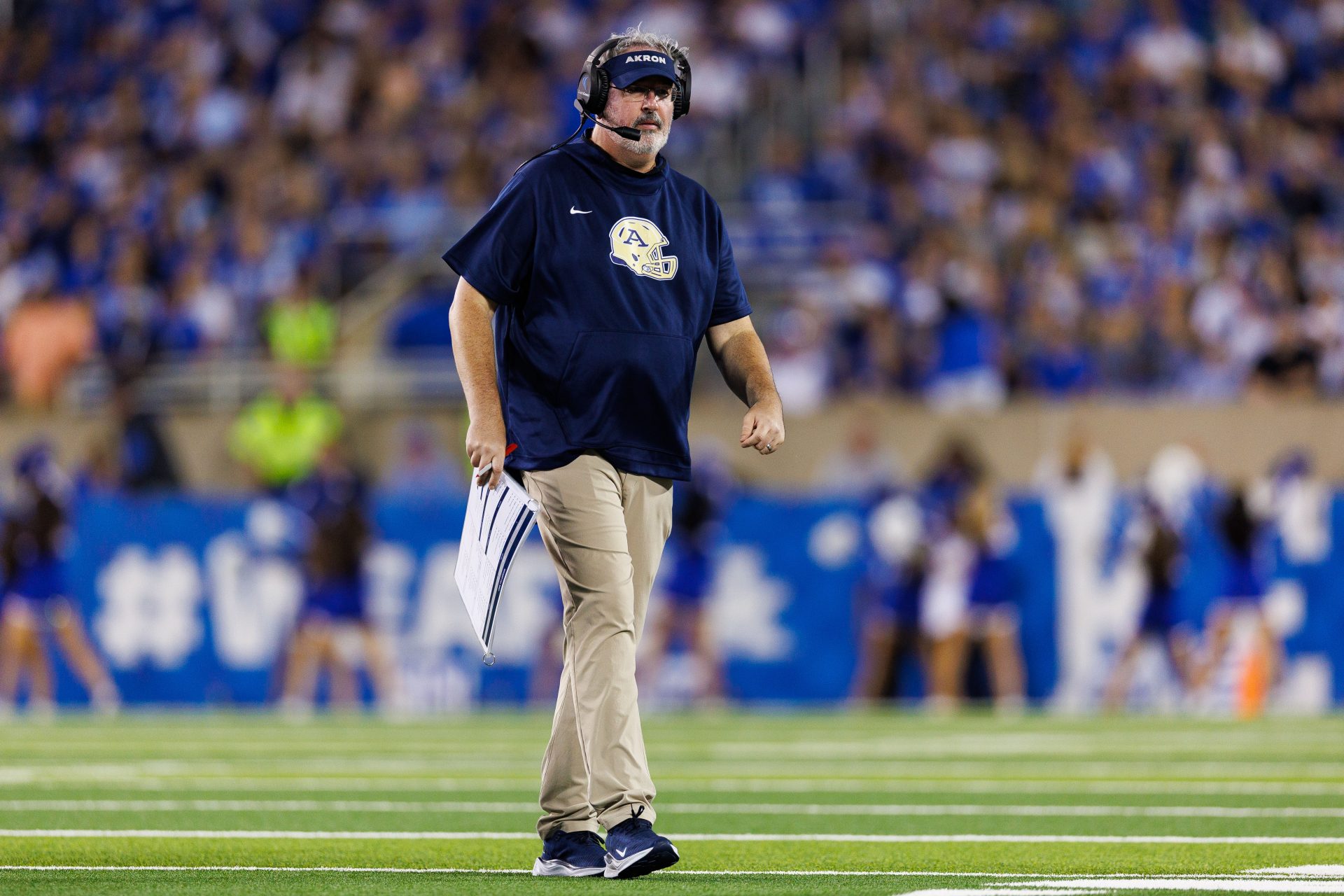 Sep 16, 2023; Lexington, Kentucky, USA; Akron Zips head coach Joe Moorhead walks off the field during a timeout in the second quarter against the Kentucky Wildcats at Kroger Field. Mandatory Credit: Jordan Prather-USA TODAY Sports