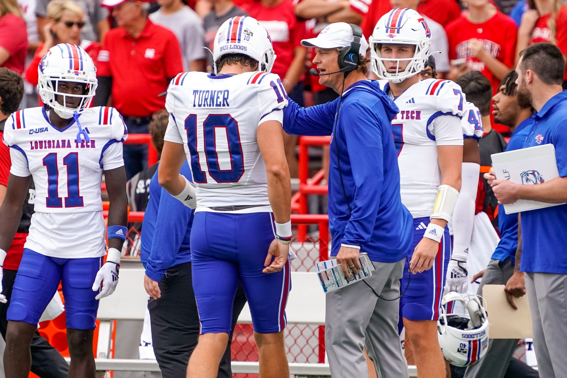 Sep 23, 2023; Lincoln, Nebraska, USA; Louisiana Tech Bulldogs head coach Sonny Cumbie talks with quarterback Jack Turner (10) during the first quarter against the Nebraska Cornhuskers at Memorial Stadium. Mandatory Credit: Dylan Widger-USA TODAY Sports