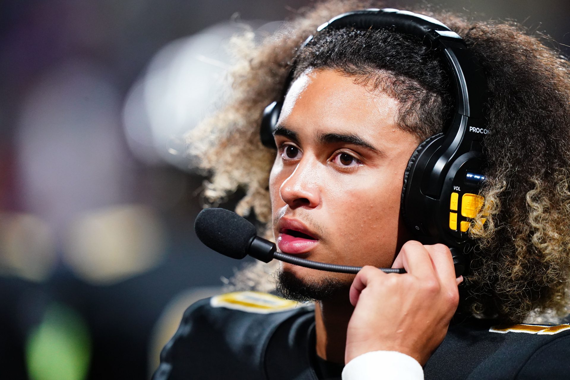 Oct 20, 2023; Carrollton, GA, USA; Carrollton Trojans quarterback Julian Lewis (10) watches on from the sidelines against the Westlake Lions during the first half at Grisham Stadium. The 15-year-old Carrollton High student has already committed to playing for the University of Southern California Trojans and has been considered one of the top high school quarterback prospects. Mandatory Credit: John David Mercer-USA TODAY Sports