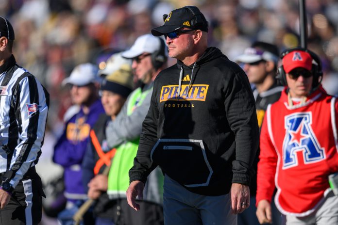 Nov 18, 2023; Annapolis, Maryland, USA; East Carolina Pirates head coach Mike Houston looks on during the fourth quarter against the Navy Midshipmen at Navy-Marine Corps Memorial Stadium. Mandatory Credit: Reggie Hildred-USA TODAY Sports