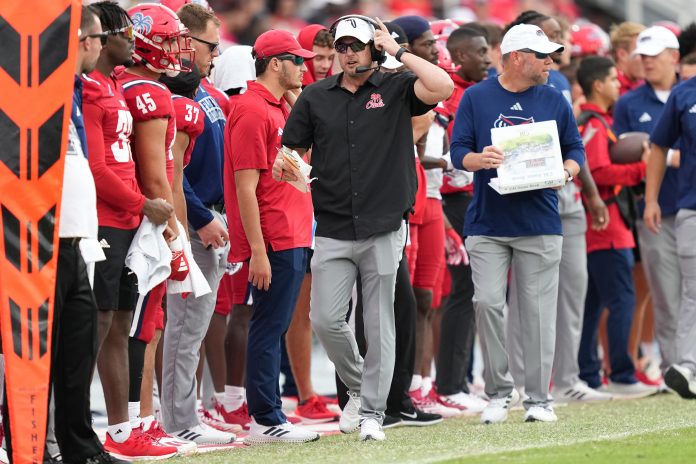 Nov 18, 2023; Boca Raton, Florida, USA; Florida Atlantic Owls head football coach Tom Herman on the sideline during the game against the Tulane Green Wave in the first half at FAU Stadium. Mandatory Credit: Jim Rassol-USA TODAY Sports