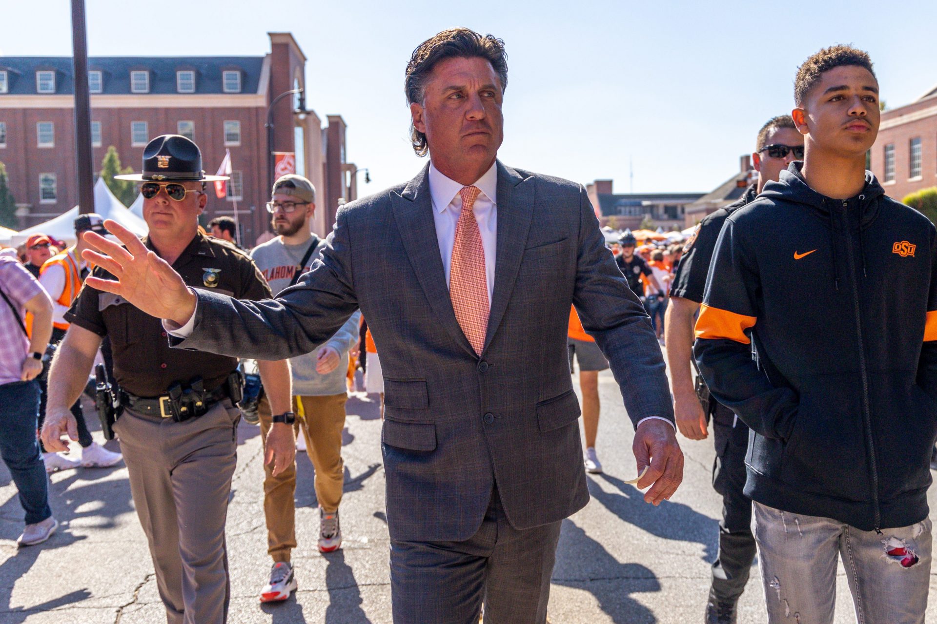 Mike Gundy walks to the stadium before a Bedlam college football game between the Oklahoma State University Cowboys (OSU) and the University of Oklahoma Sooners (OU) at Boone Pickens Stadium in Stillwater, Okla., Saturday, Nov. 4, 2023.