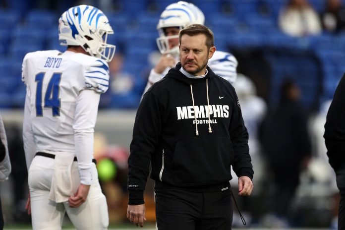 Dec 29, 2023; Memphis, TN, USA; Memphis Tigers head coach Ryan Silverfield watches during warm ups prior to the game against the Iowa State Cyclones at Simmons Bank Liberty Stadium. Mandatory Credit: Petre Thomas-USA TODAY Sports