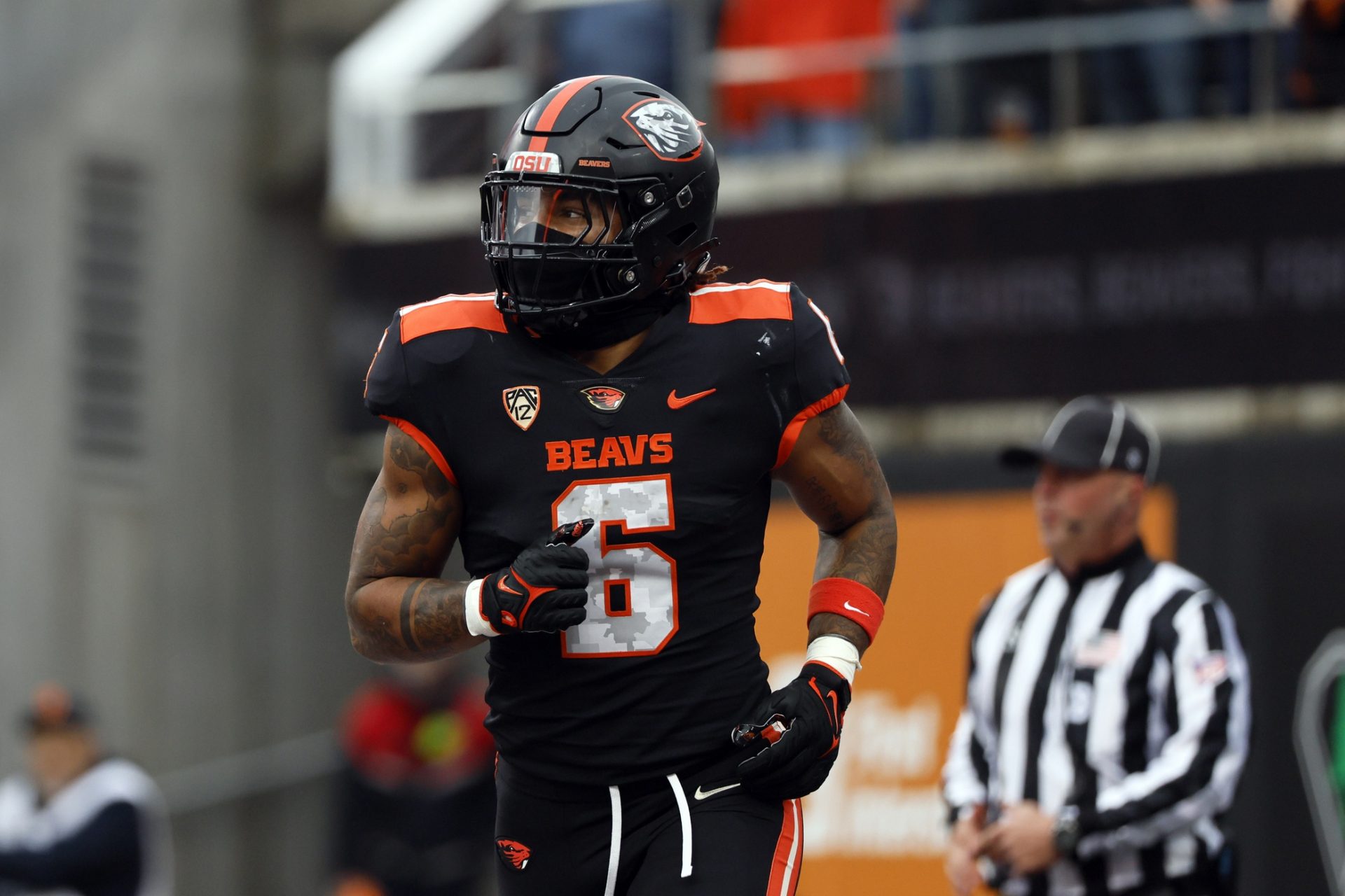 Oregon State Beavers running back Damien Martinez (6) celebrates after scoring a touchdown during the first half against the Stanford Cardinal at Reser Stadium.