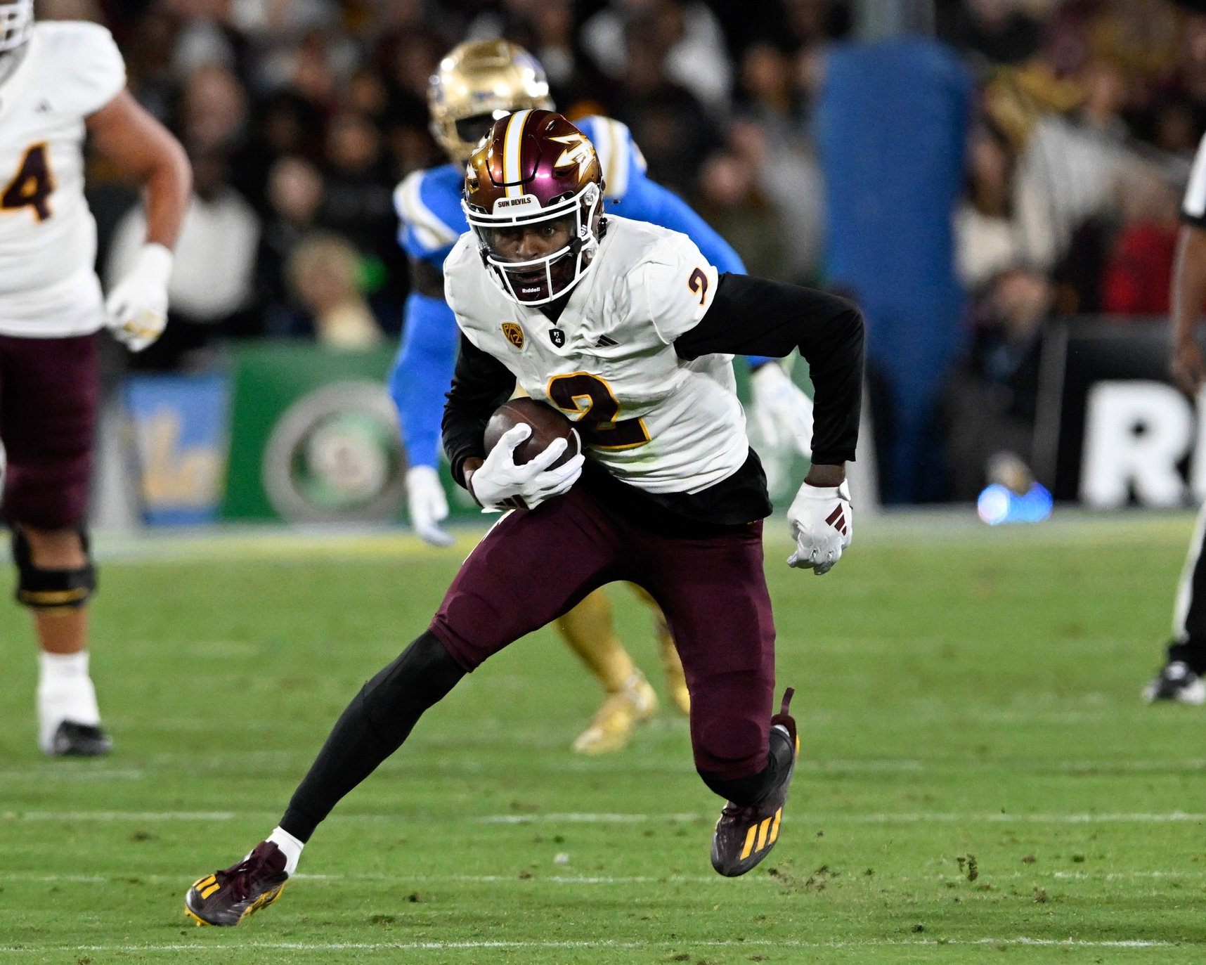 Arizona State Sun Devils wide receiver Elijhah Badger (2) runs after a catch against the UCLA Bruins after a catch during the second half at the Rose Bowl.