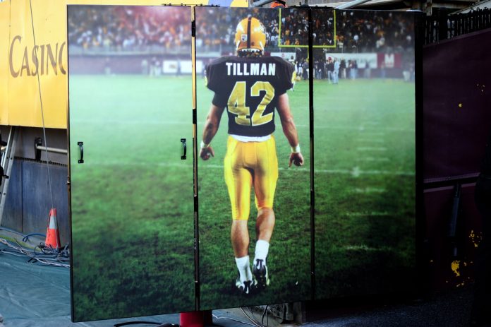 General view of a photo of former Arizona State Sun Devils player Pat Tillman at the end of Tillman Tunnel where the Arizona State Sun Devils players enter the field prior to the game against the Sacramento State Hornets at Sun Devil Stadium.