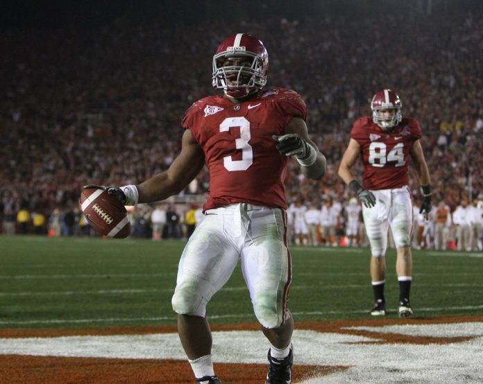 Alabama running back Trent Richardson (3) celebrates a fourth quarter touchdown against Texas in this years National Championship in the Rose Bowl in Pasadena.