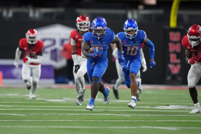 Dec 2, 2023; Las Vegas, NV, USA; Boise State Broncos running back Ashton Jeanty (2) carries the ball against the UNLV Rebels in the second half during the Mountain West Championship at Allegiant Stadium. Mandatory Credit: Kirby Lee-USA TODAY Sports