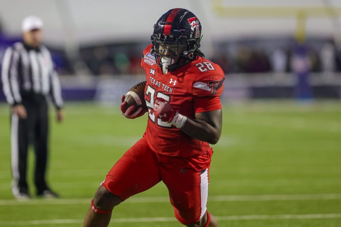 Texas Tech running back Tahj Brooks (28) barreling toward the end zone during the 47th Radience Technology Independence Bowl Saturday evening, December 16, 2023, in Shreveport, La.