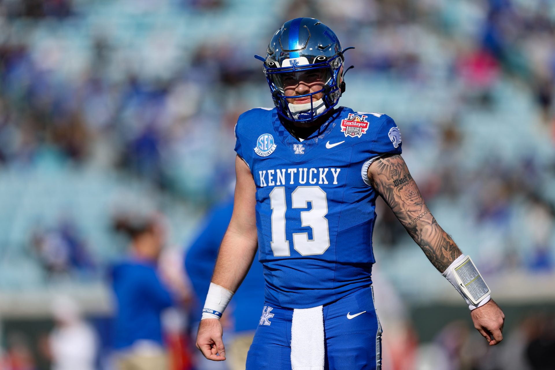 Dec 29, 2023; Jacksonville, FL, USA; Kentucky Wildcats quarterback Devin Leary (13) warms up before a game against the Clemson Tigers the Gator Bowl at EverBank Stadium. Mandatory Credit: Nathan Ray Seebeck-USA TODAY Sports