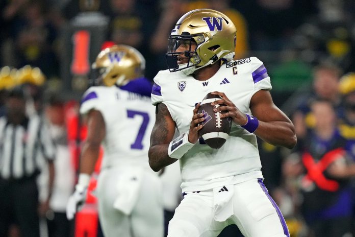 Jan 8, 2024; Houston, TX, USA; Washington Huskies quarterback Michael Penix Jr. (9) drops back to throws a pass during the second quarter against the Michigan Wolverines in the 2024 College Football Playoff national championship game at NRG Stadium. Mandatory Credit: Kirby Lee-USA TODAY Sports
