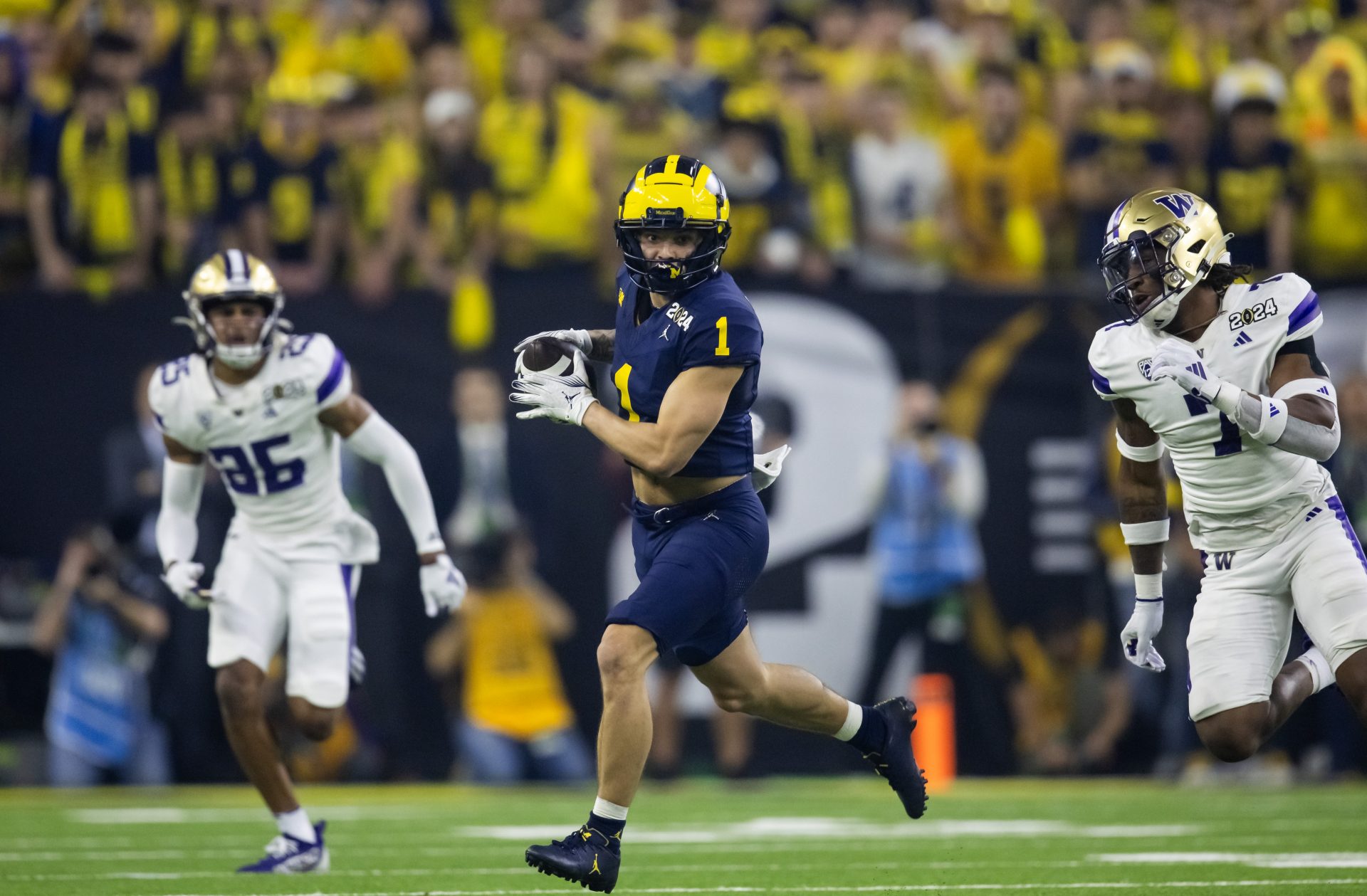 Jan 8, 2024; Houston, TX, USA; Michigan Wolverines wide receiver Roman Wilson (1) against the Washington Huskies during the 2024 College Football Playoff national championship game at NRG Stadium. Mandatory Credit: Mark J. Rebilas-USA TODAY Sports