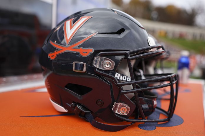 A general view of a Virginia Cavaliers helmet on the sideline during the game between the Virginia Cavaliers and the North Carolina Tar Heels at Scott Stadium.