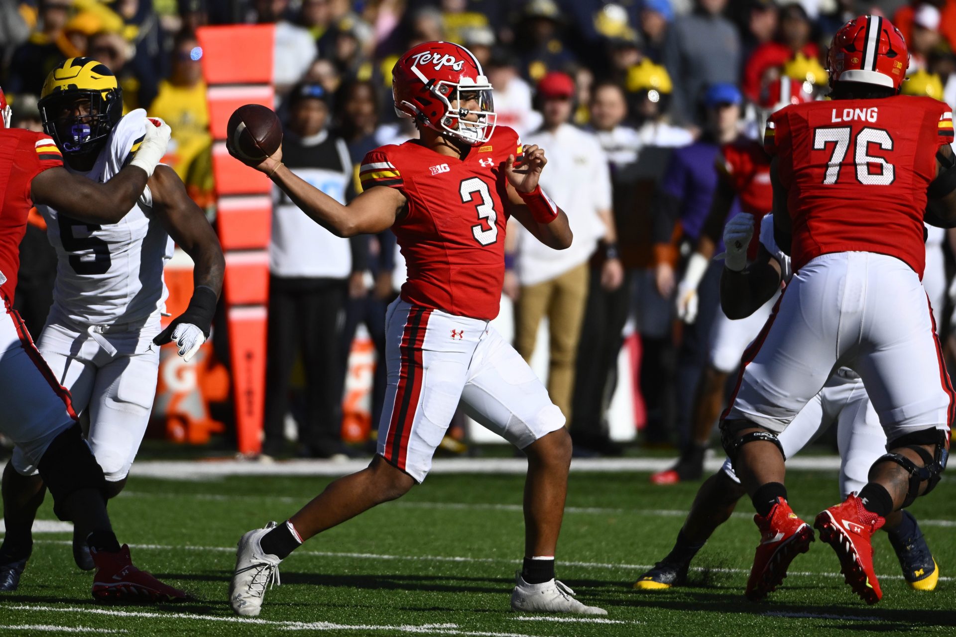 Maryland Terrapins quarterback Taulia Tagovailoa (3) throws a pass against the Michigan Wolverines during the first half at SECU Stadium. Mandatory Credit: Brad Mills-USA TODAY Sports