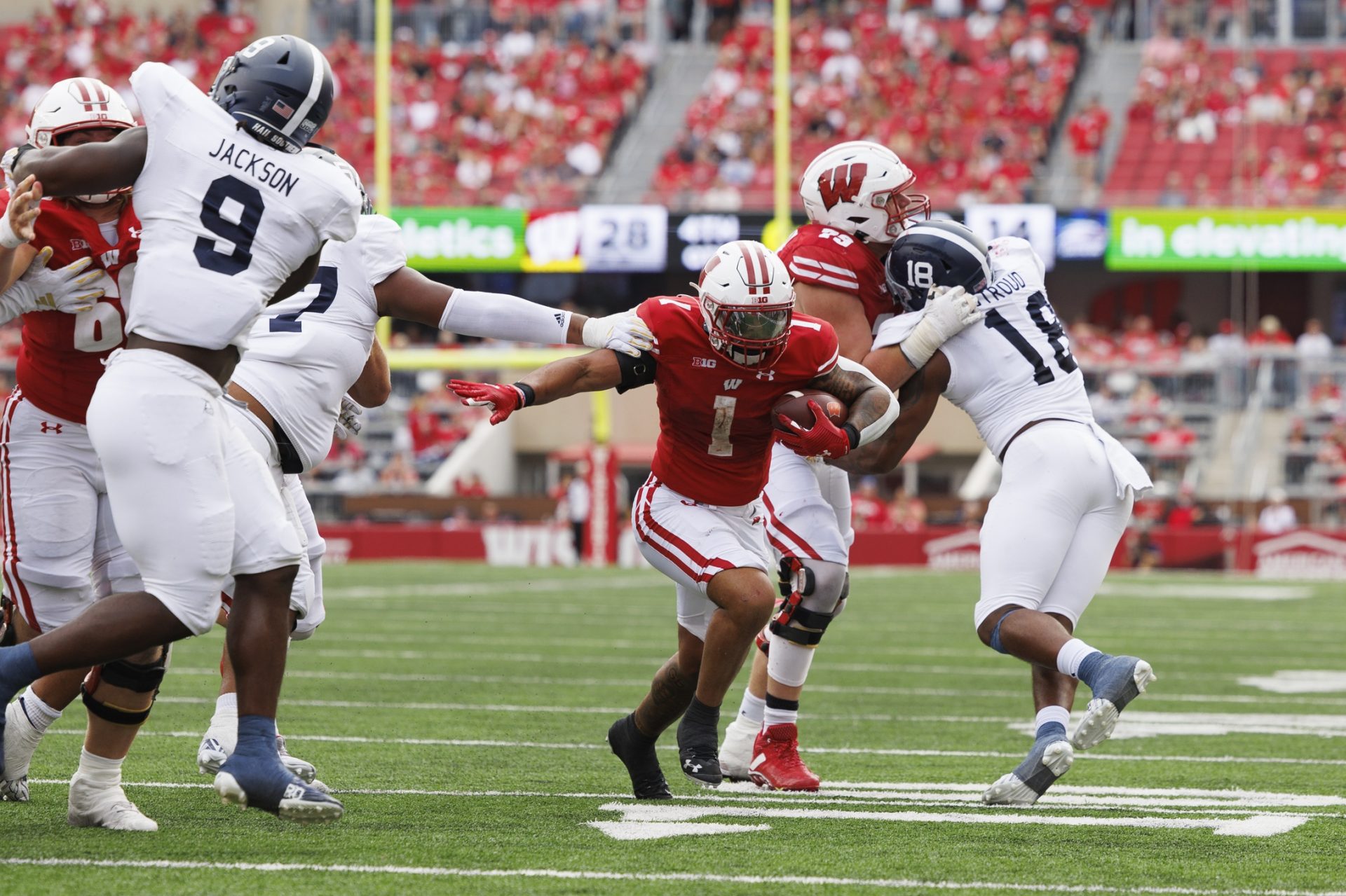 Wisconsin Badgers running back Chez Mellusi (1) rushes with the football during the fourth quarter against the Georgia Southern Eagles at Camp Randall Stadium.