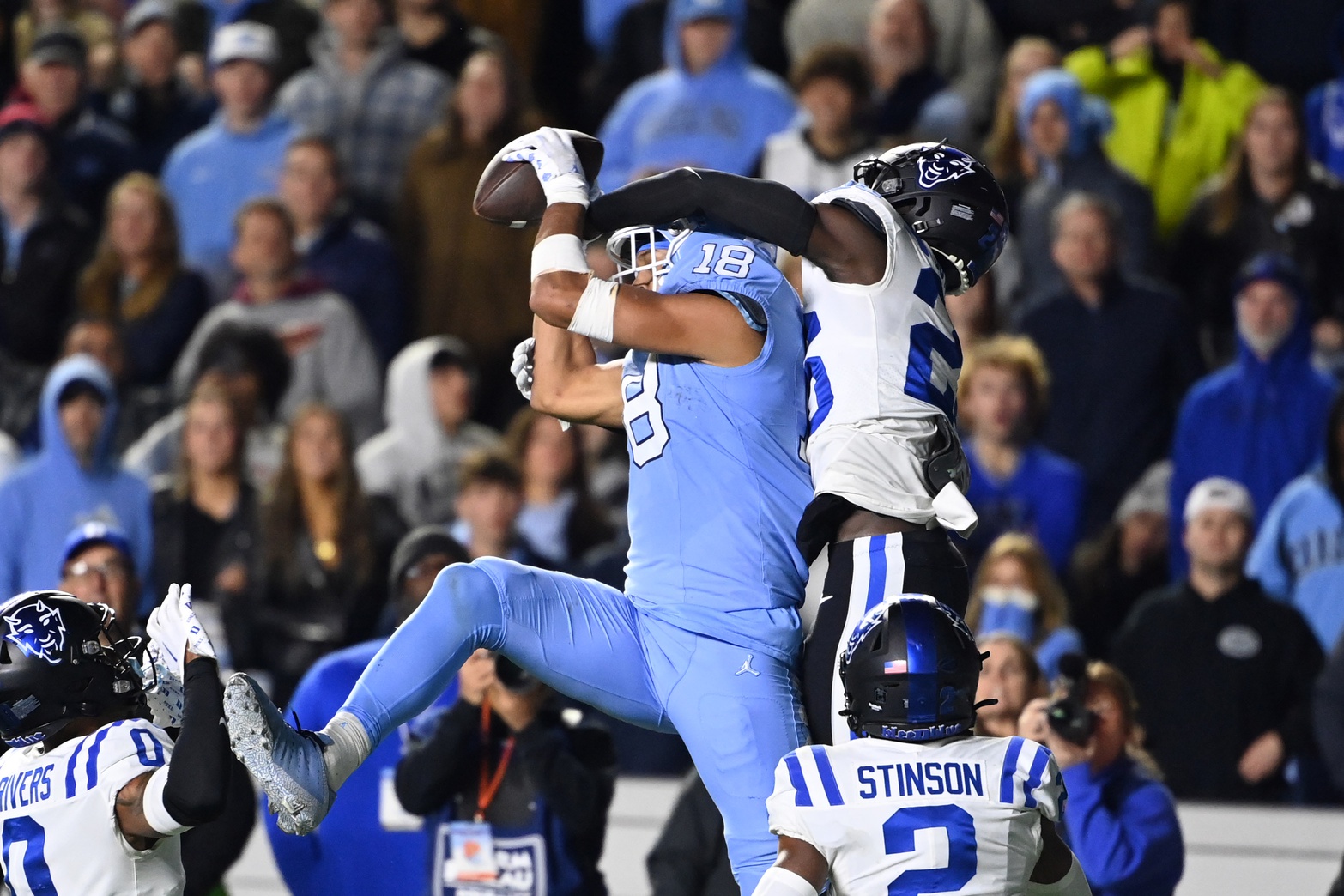 North Carolina Tar Heels tight end Bryson Nesbit (18) catches the ball as Duke Blue Devils cornerback Joshua Pickett (26) defends in the fourth quarter at Kenan Memorial Stadium.