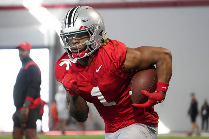Ohio State Buckeyes running back Quinshon Judkins (1) runs during the first spring practice at the Woody Hayes Athletic Center.