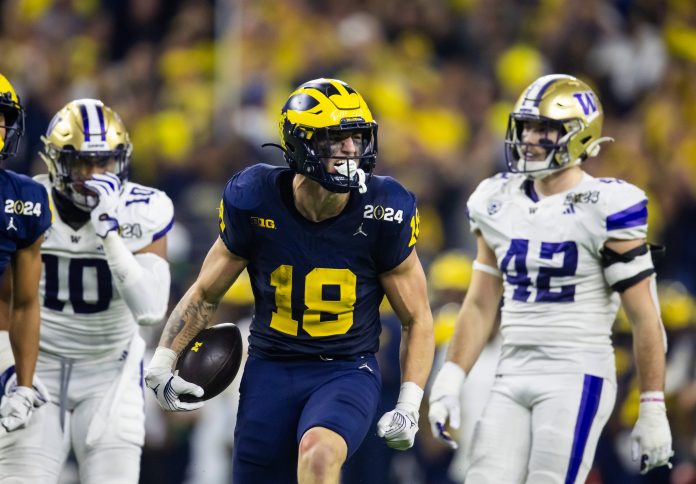 Michigan Wolverines tight end Colston Loveland (18) against the Washington Huskies during the 2024 College Football Playoff national championship game at NRG Stadium.
