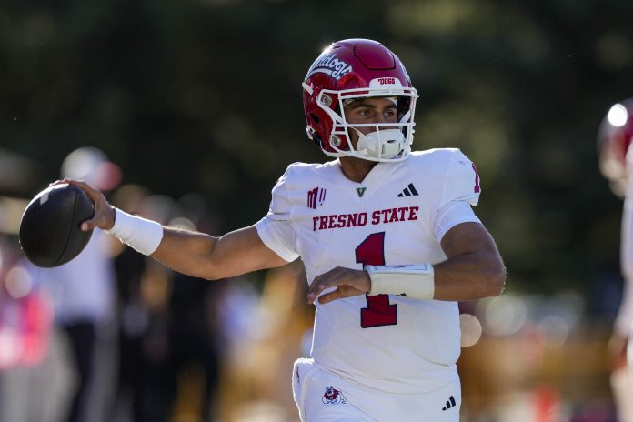 Fresno State Bulldogs quarterback Mikey Keene (1) warms up before game against the Wyoming Cowboys at Jonah Field at War Memorial Stadium.