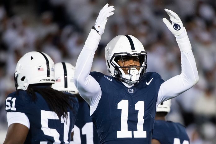 Penn State linebacker Abdul Carter (11) motions to the crowd during a White Out game against Iowa Saturday, Sept. 23, 2023, in State College, Pa. Carter, a sophomore, has recorded 11 total tackles, one sack and one interception.