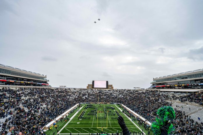 Two U.S. Navy EA-18 Growler aircraft fly over Notre Dame Stadium before the game between the Notre Dame Fighting Irish and the Boston College Eagles.