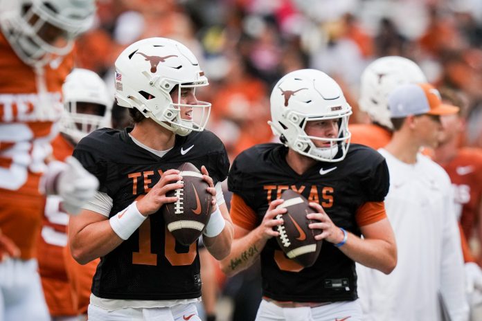 Texas Longhorns quarterbacks Arch Manning (16), left, and Quinn Ewers (3) throw passes while warming up ahead of the Longhorns' spring Orange and White game at Darrell K Royal Texas Memorial Stadium.