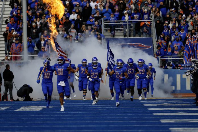 Nov 24, 2023; Boise, Idaho, USA; Boise State Broncos take to the field prior to the first half against the Air Force Falcons at Albertsons Stadium. Mandatory Credit: Brian Losness-USA TODAY Sports