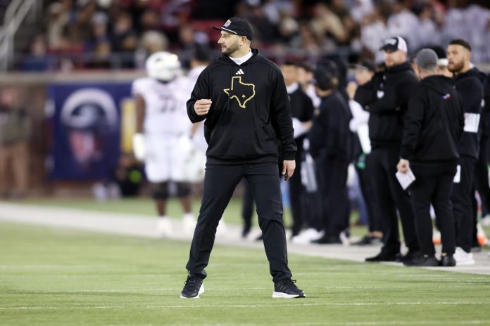 Dec 26, 2023; Dallas, TX, USA; Texas State Bobcats head coach GJ Kinne reacts to a call in the first half against the Rice Owls at Gerald J Ford Stadium. Mandatory Credit: Tim Heitman-USA TODAY Sports